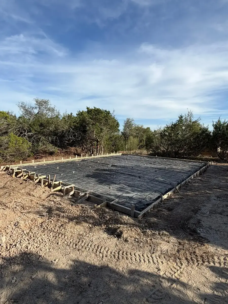 Rebar grid tied inside forms for a concrete pad in Thurston County, WA
