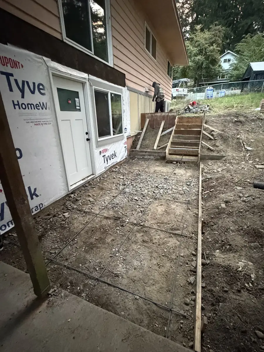 Patio forms set over a compacted gravel base before a concrete pour near Olympia, WA
